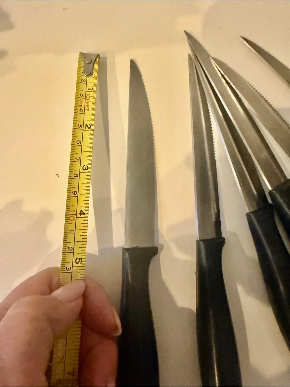 Set of 8 Henckels Cuttery Knives with Black  Handle